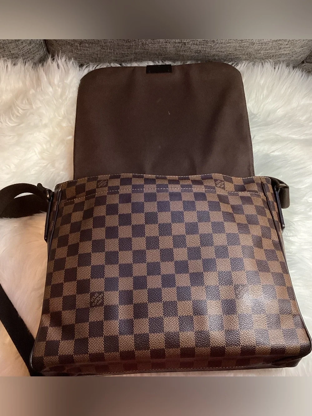 Louis Vuitton Damier Ebene District MM messenger bag.